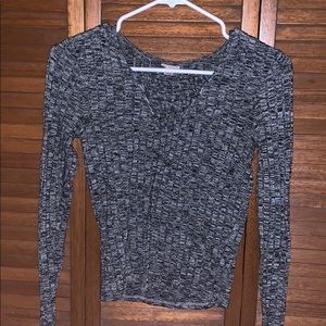 Ribbed long sleeve lace up on the front.